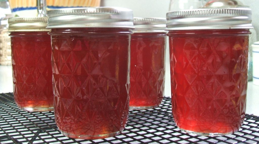 Half pint jars of Beautyberry Jelly