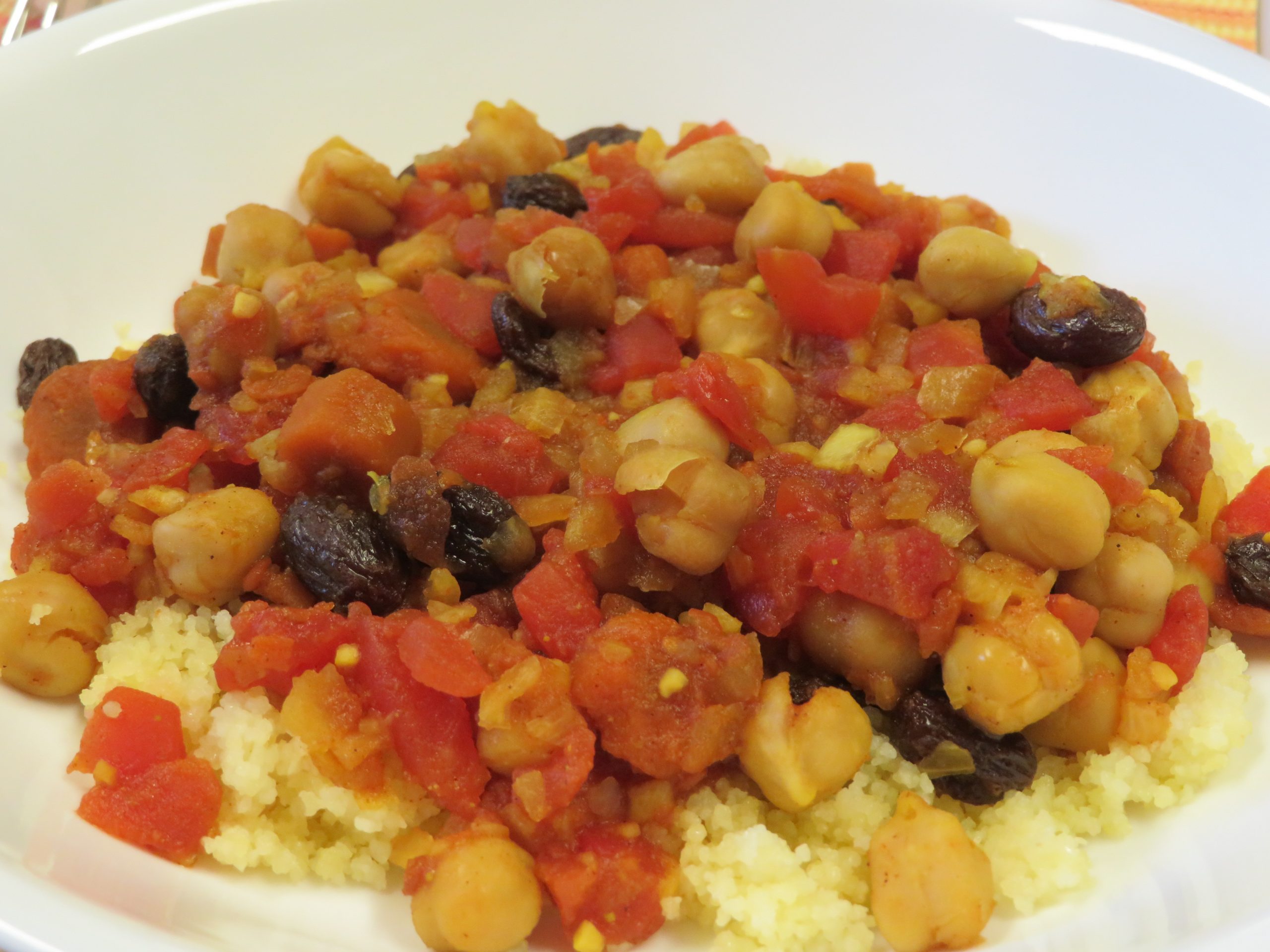 Chickpea Tajine over couscous in a bowl