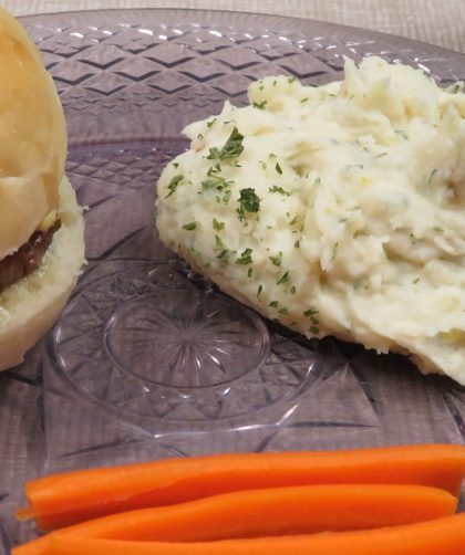 Mashed Potato Salad on a plate with a hamburger and carrot sticks