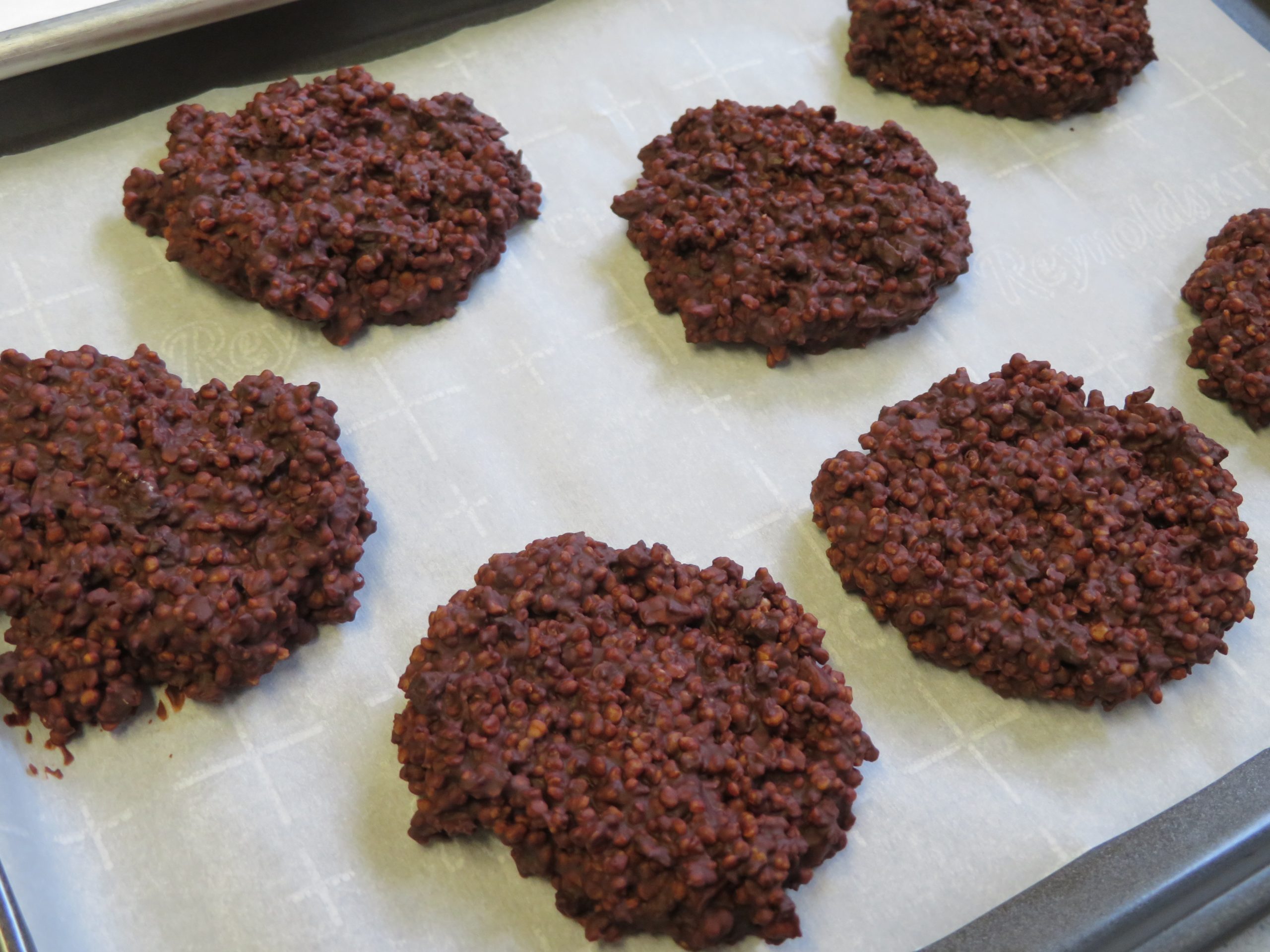 Chocolate Cranberry Pecan Quinoa Crisps on pan