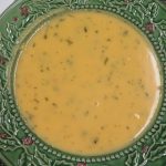 A bowl of Creamy Cheddar Broccoli Soup