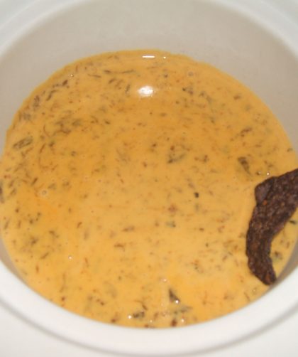 Green Chile Queso in a small slow cooker