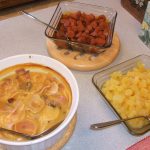 Home storage dinner of ham and potato casserole, brown sugar carrots, and pineapple tidbits