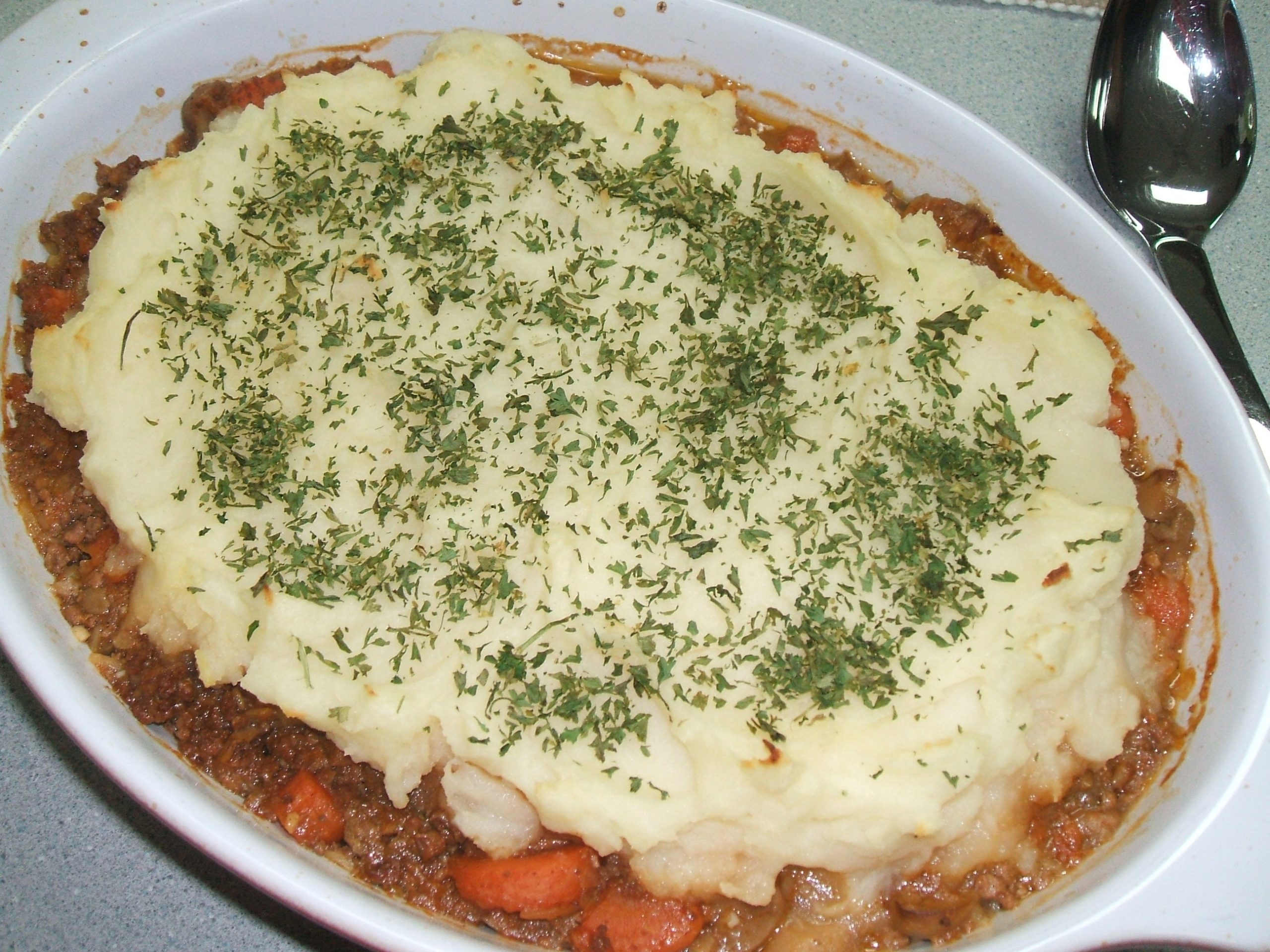 Cottage Pie baked in an oval casserole dish