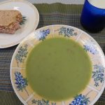 A bowl of Green Pea Soup, a Spam Salad sandwich on homemade bread, and a glass of milk